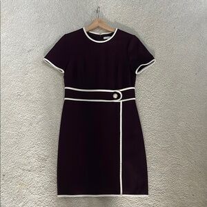 Elegant Black Dress with White Trim